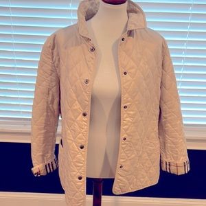 Woman’s Burberry Quilted Jacket Size Medium.
